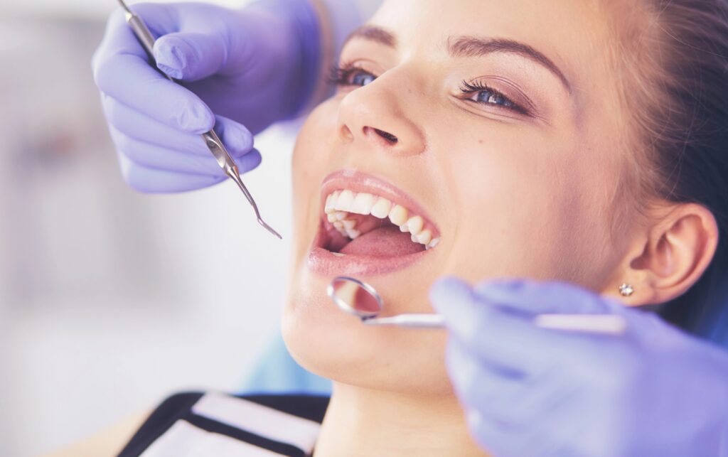 Close-up of female patient at dentist