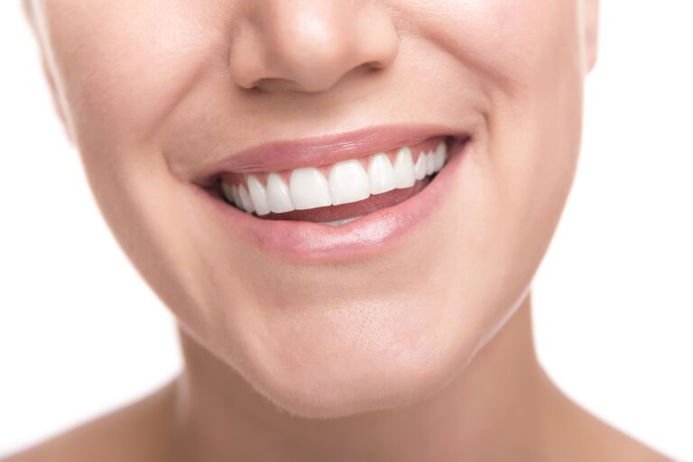 Close-up of young woman smiling